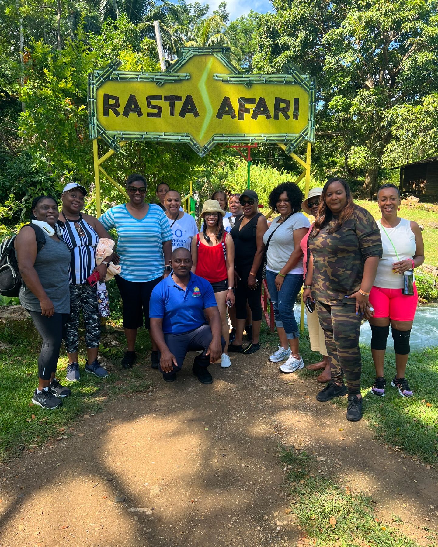 Image of Founder with clients from Jamaica Eternal Tours